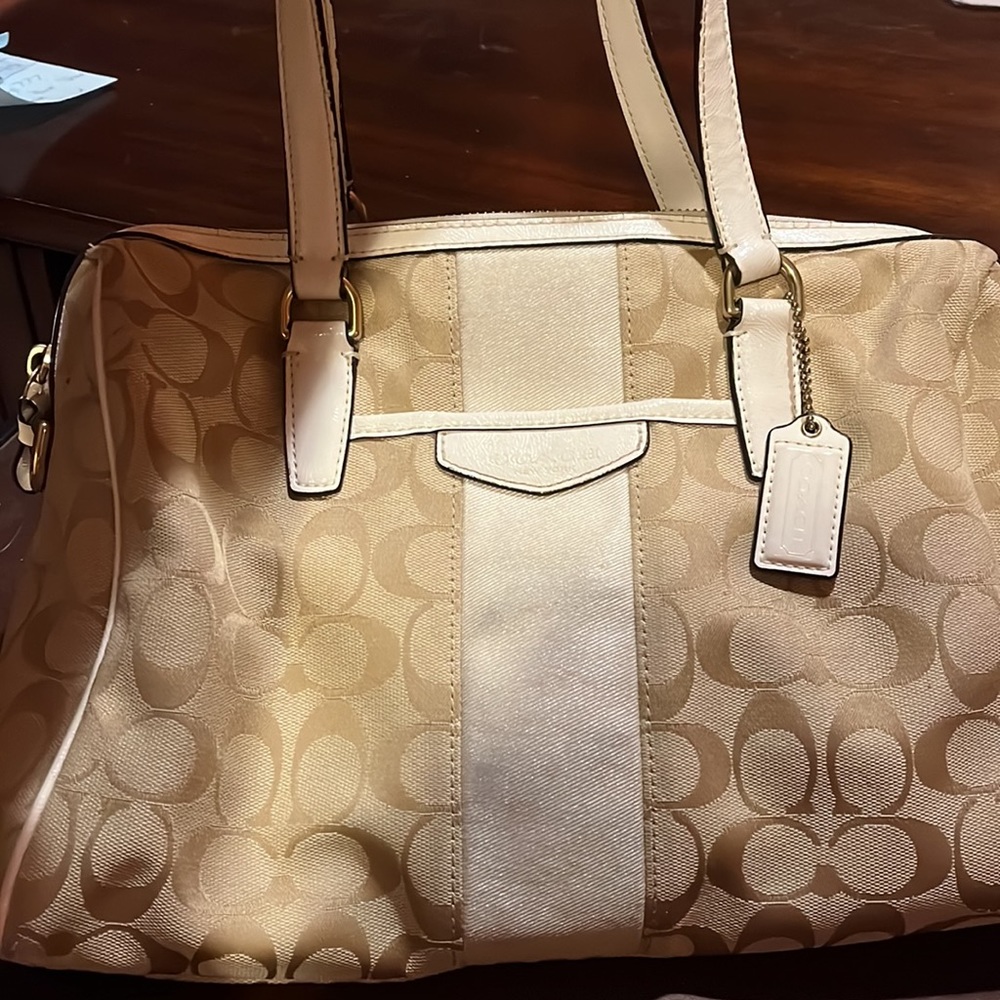 Coach purse. Cream color C1480-F28505